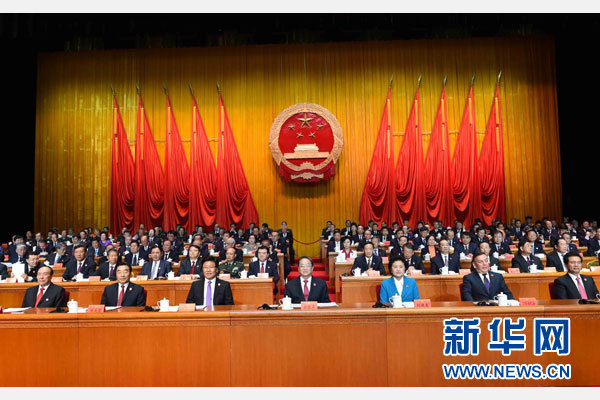 10月1日，慶祝中華人民共和國成立66周年暨新疆維吾爾自治區(qū)成立60周年大會在新疆人民會堂隆重舉行。 新華社記者 饒愛民 攝
