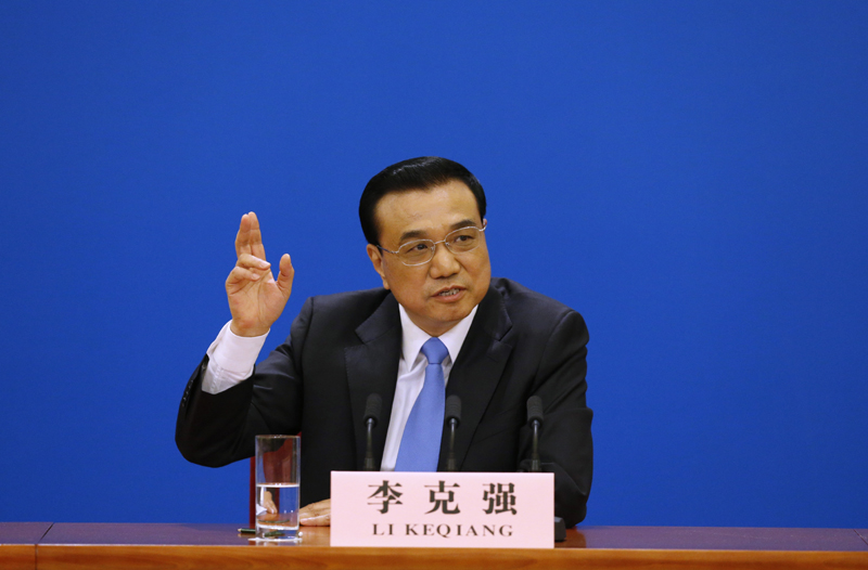 3月15日，國務(wù)院總理李克強在北京人民大會堂與中外記者見面，并回答記者提問。 新華社記者 沈伯韓 攝
