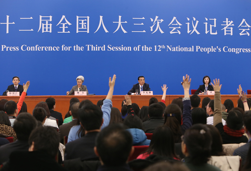 3月15日，國務(wù)院總理李克強在北京人民大會堂與中外記者見面，并回答記者提問。新華社記者 呂迅 攝