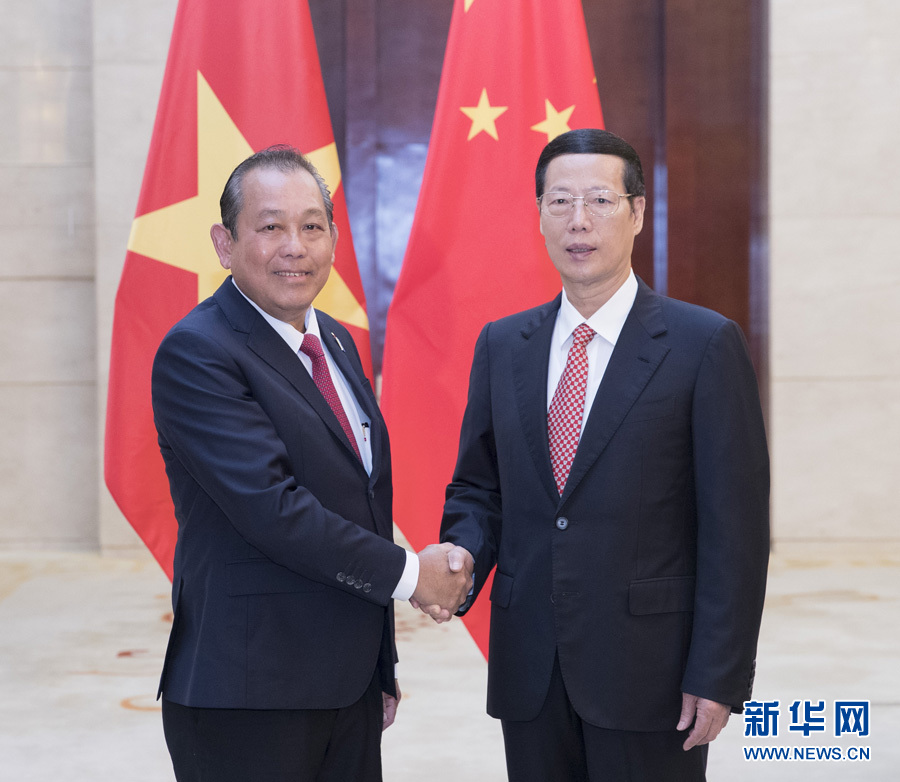  9月11日，中共中央政治局常委、國務(wù)院副總理張高麗在廣西南寧會見前來出席第十四屆中國－東盟博覽會和中國－東盟商務(wù)與投資峰會的越南常務(wù)副總理張和平。新華社記者王曄攝