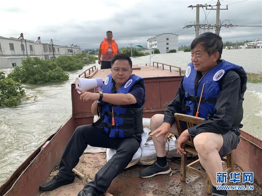 （新華全媒頭條·圖文互動(dòng)）（1）筑起共御水患的鋼鐵長堤——戰(zhàn)洪一線的“干群關(guān)系新答卷”