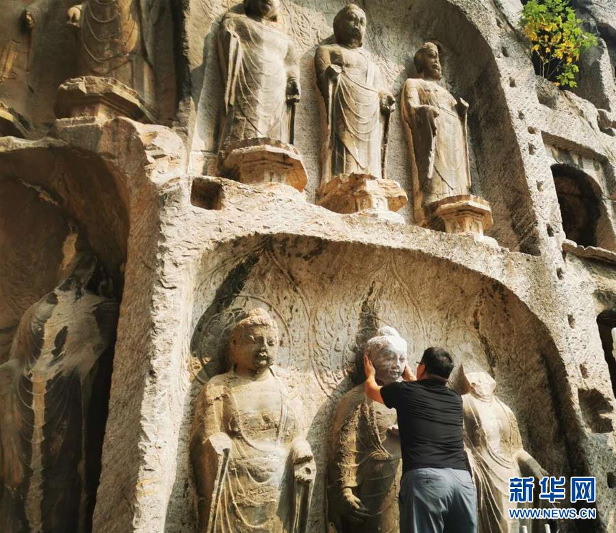 （圖文互動）（4）合體了，龍門石窟流散佛首首次實現(xiàn)“數(shù)字復(fù)位”