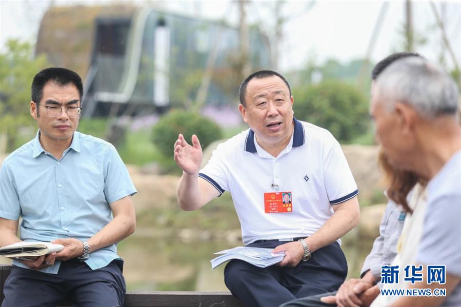 （新華全媒頭條·兩會精神看落實·圖文互動）（2）整體謀劃、系統(tǒng)升級、全面提升——落實全國兩會精神織牢織密公共衛(wèi)生防護網