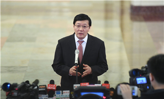 全國社?；鹄硎聲硎麻L樓繼偉接受采訪