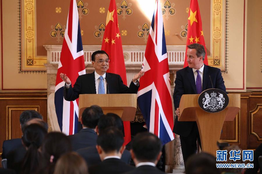 6月17日，國(guó)務(wù)院總理李克強(qiáng)同英國(guó)首相卡梅倫在倫敦舉行中英總理年度會(huì)晤后共同會(huì)見記者。新華社記者 龐興雷 攝