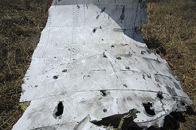 MH17墜機現場照片下藏著多少信息？
