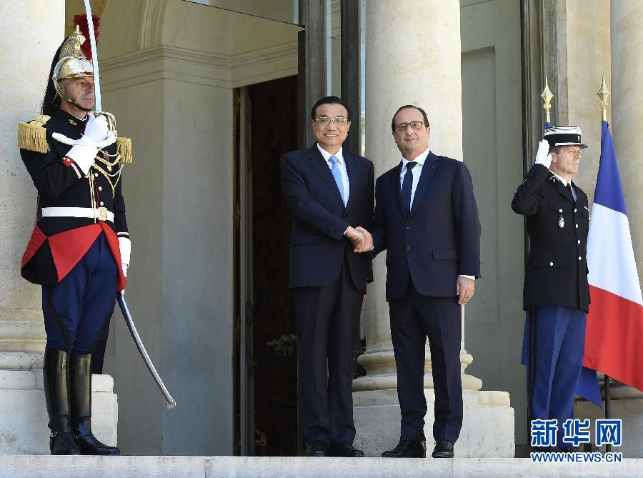 當?shù)貢r間6月30日下午，國務院總理李克強在巴黎愛麗舍宮會見法國總統(tǒng)奧朗德。 新華社記者李學仁攝