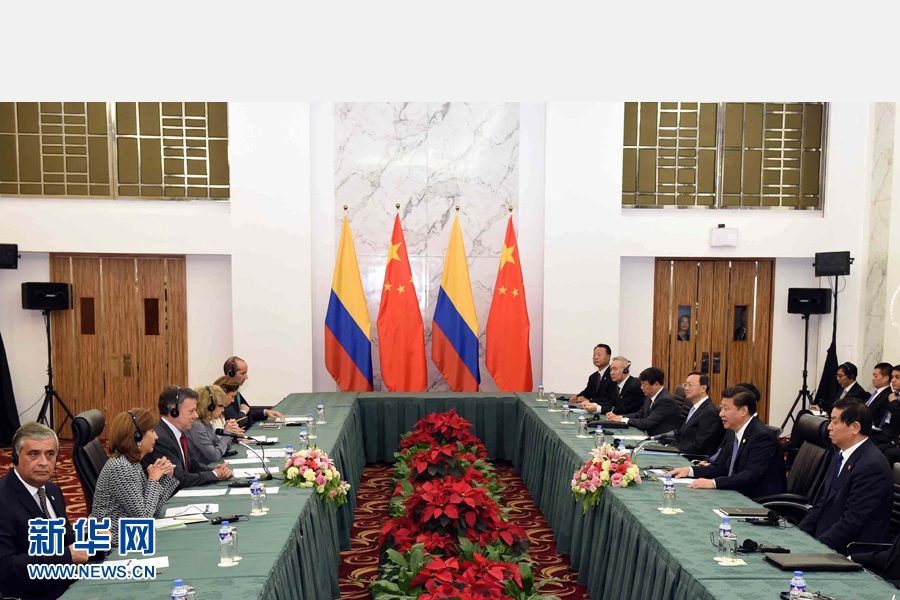 11月18日，國(guó)家主席習(xí)近平在菲律賓馬尼拉會(huì)見哥倫比亞總統(tǒng)桑托斯。 新華社記者 饒愛民 攝