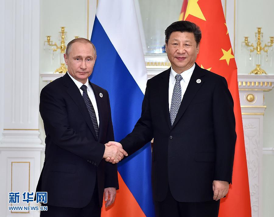 6月23日，國(guó)家主席習(xí)近平在烏茲別克斯坦塔什干會(huì)見俄羅斯總統(tǒng)普京。新華社記者李濤攝