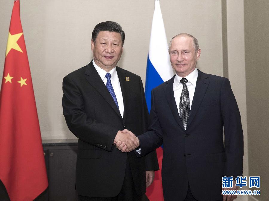 6月8日，國(guó)家主席習(xí)近平在阿斯塔納會(huì)見俄羅斯總統(tǒng)普京。 新華社記者蘭紅光 攝